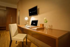 TV a/nebo společenská místnost v ubytování H3 Hotel Paulista