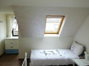 Postel nebo postele na pokoji v ubytování Retro apartment