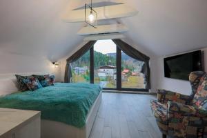 Posteľ alebo postele v izbe v ubytovaní Apartament Marron
