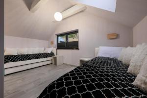 Posteľ alebo postele v izbe v ubytovaní Apartament Marron