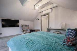 Posteľ alebo postele v izbe v ubytovaní Apartament Marron