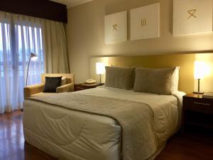 Llit o llits en una habitació de Hotel Grand Plaza Paulista