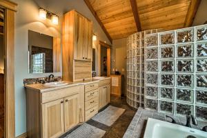 a bathroom with a sink and a shower at Home with Kachemak Bay View - 5 Miles to Downtown! in Homer +31 photos