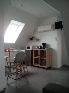 Kuchyň nebo kuchyňský kout v ubytování L'Escapade Lochoise + 11 fotografií