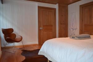 Letto o letti in una camera di Alpine Haus