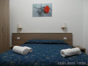 Postel nebo postele na pokoji v ubytování Marziah Inn