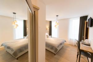 Letto o letti in una camera di Berdorfer Eck - Bed&Breakfast