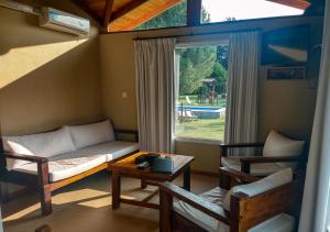 Фотография из галереи Cabañas Los Sauces в городе Тандил +42 фотографии