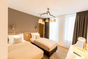 Letto o letti in una camera di Berdorfer Eck - Bed&Breakfast
