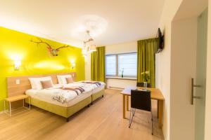 Letto o letti in una camera di Berdorfer Eck - Bed&Breakfast