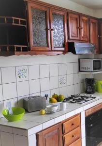 Kitchen o kitchenette sa TI CALEBASSE
