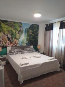 Postel nebo postele na pokoji v ubytování Hotel Hobby