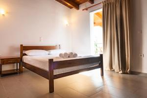 Postel nebo postele na pokoji v ubytování Margarita Guesthouse