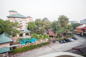 an aerial view of a hotel with a parking lot at Diana Garden Resort - SHA Extra Plus in Pattaya