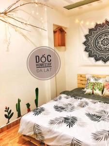 Postel nebo postele na pokoji v ubytování Dốc homestay Đà Lạt