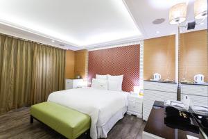 Krevet ili kreveti u jedinici u objektu 168 Motel-PingZhen