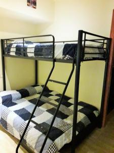 Krevet ili kreveti na sprat u jedinici u okviru objekta Arion Garden Apartment