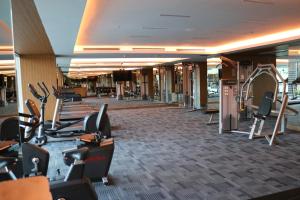 a gym on a cruise ship with cardio equipment at Acacia Hotel Davao in Davao City