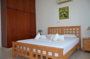 Ένα ή περισσότερα κρεβάτια σε δωμάτιο στο Faros Beach Apartment A102 +25 φωτογραφίες