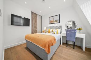 City Prime Apartments客房内的一张或多张床位