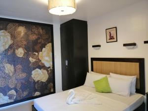 Postel nebo postele na pokoji v ubytování Casa Herminia Baler