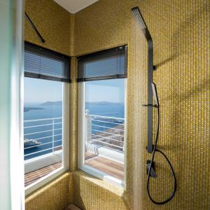 Fotografie z fotogalerie ubytování Nefeles Luxury Suites ve Fiře + 37 fotografií