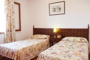 A bed or beds in a room at Villa Solana