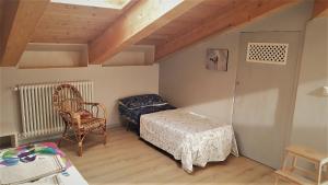 Postel nebo postele na pokoji v ubytování Loft 29 mansardato con ampio terrazzo