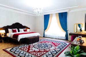 Postel nebo postele na pokoji v ubytování Boutique Hotel Silk Way + 30 fotografií