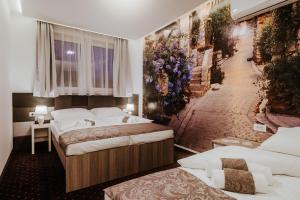 Postel nebo postele na pokoji v ubytování Hotel & Spa Meydan + 37 fotografií