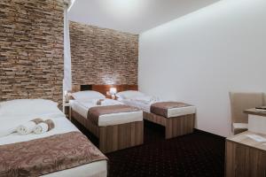 Postel nebo postele na pokoji v ubytování Hotel & Spa Meydan