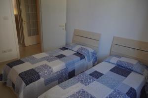 Postel nebo postele na pokoji v ubytování Scerne Holiday Service Adina