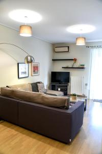 a bedroom with a large bed in a room at Two bedroom apartment in Kesariani in Athens