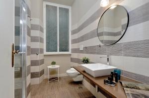 A bathroom at Monti Apartments - My Extra Home