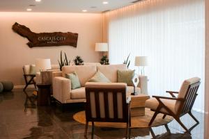 Гостиная зона в Cascais City & Beach Hotel
