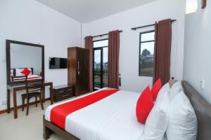 Tempat tidur dalam kamar di Delphin Hotel