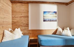 Posteľ alebo postele v izbe v ubytovaní Hotel Riederhof- Urlaub mit WAU!