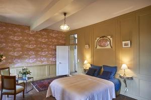Postel nebo postele na pokoji v ubytování B&B Le Plessix - Manoir le Plessix Madeuc