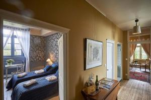 Postel nebo postele na pokoji v ubytování B&B Le Plessix - Manoir le Plessix Madeuc