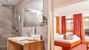 Kúpeľňa v ubytovaní Hotel Riederhof- Urlaub mit WAU!