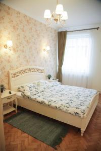 Een bed of bedden in een kamer bij Transylvania Green Confort