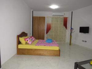 a bedroom with a bed in a room at Apartment Sorrento near the sea RedSeaLine in Hurghada