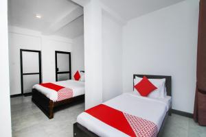Tempat tidur dalam kamar di Delphin Hotel
