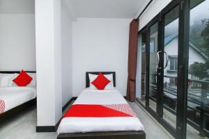 Tempat tidur dalam kamar di Delphin Hotel
