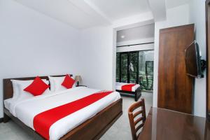 Tempat tidur dalam kamar di Delphin Hotel