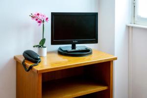 TV a/nebo společenská místnost v ubytování Hotel Montecodeno