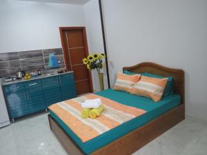 A bed or beds in a room at Apartment Bella Vita near the sea RedSeaLine