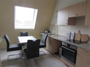 Kuchyň nebo kuchyňský kout v ubytování Ferienwohnung M.Kopp