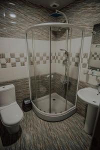 Vannituba majutusasutuses Discovery Hotel