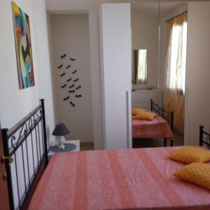 Casa vacanze Antonella Pula a 750mt dal centro. 객실 침대